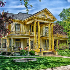 classic yellow house in suburbs