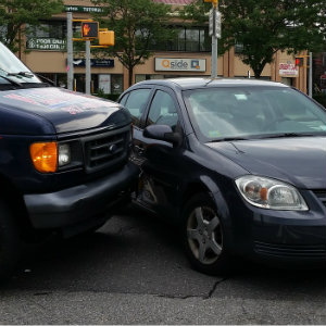 commercial van compact car accident