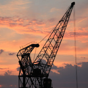 crane sunset clouds