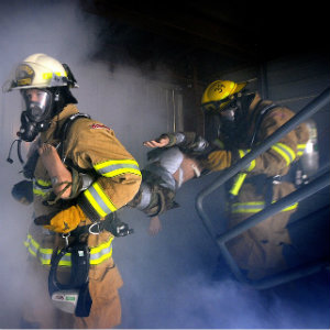 firefighters rescuing man