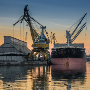 ship loading at sunset