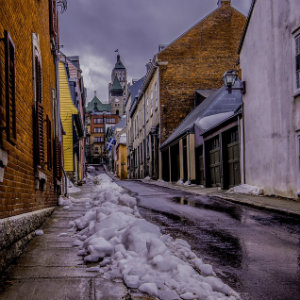 snowy side street in quebec