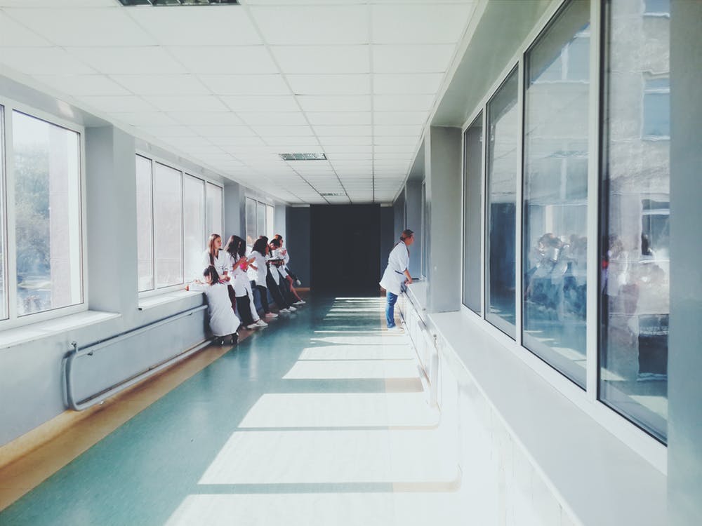 staff in hospital hallway