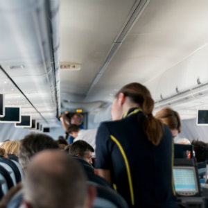 flight attendant serving passengers