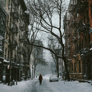 walking down snowy street